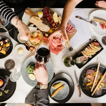 Friends sharing a grazing table